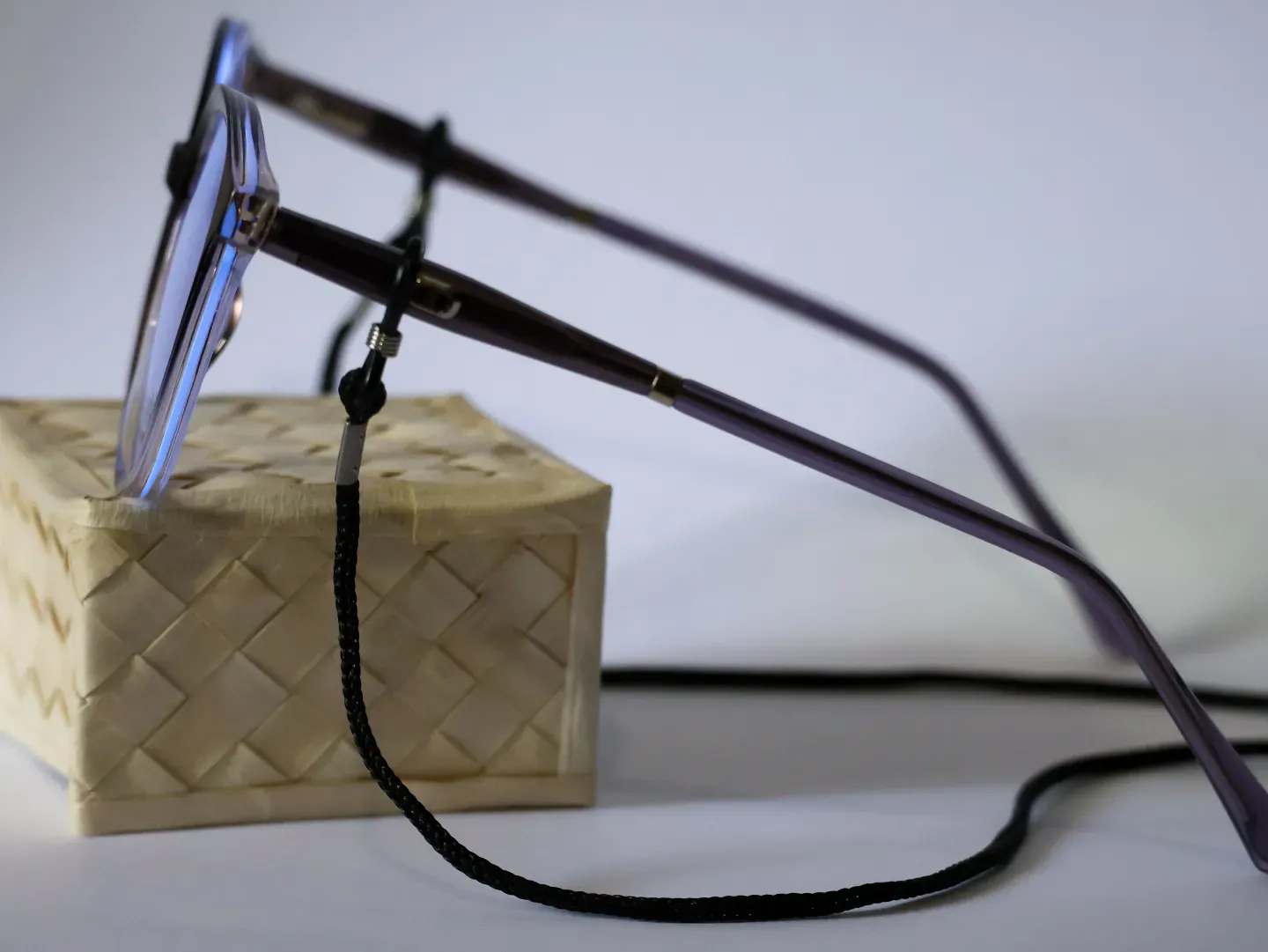 Comfortable braided fabric eyeglass cord in multiple colors.