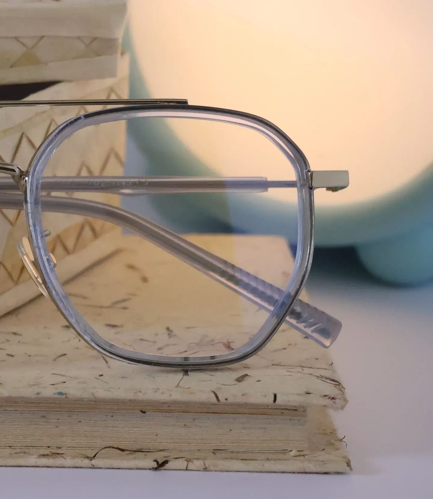 Detailed shot of composite eyeglass hinges. Visit our Bandarawela branch for expert optical services and specs repair.