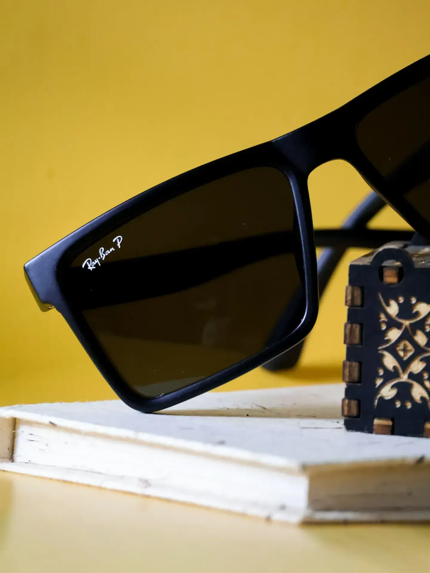 Profile of oversized black sunnies. Essential dark glasses for driving in Sri Lanka.