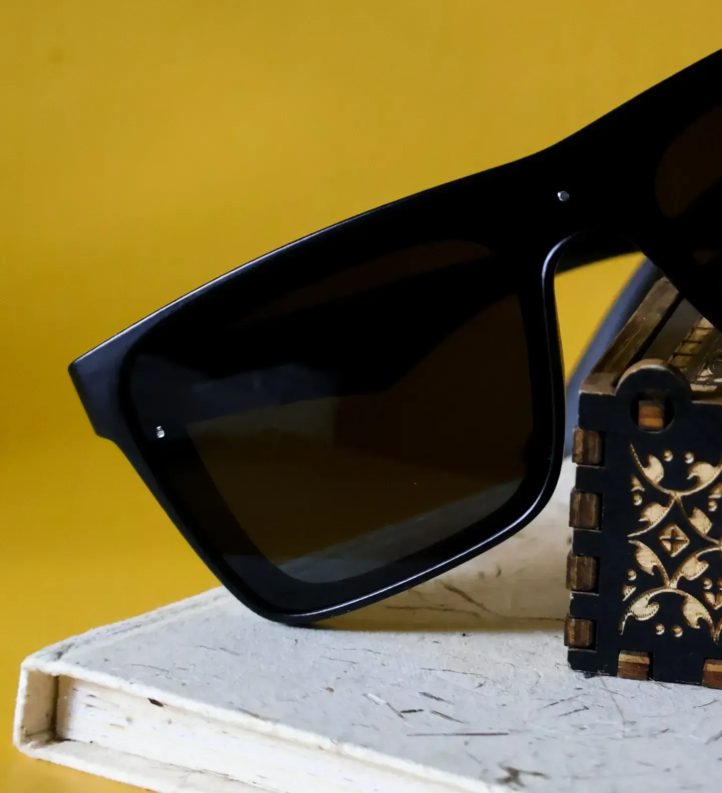 Side angle of Vogue Square black sunnies. Prevent UV damage with our protective specs in tropical weather.